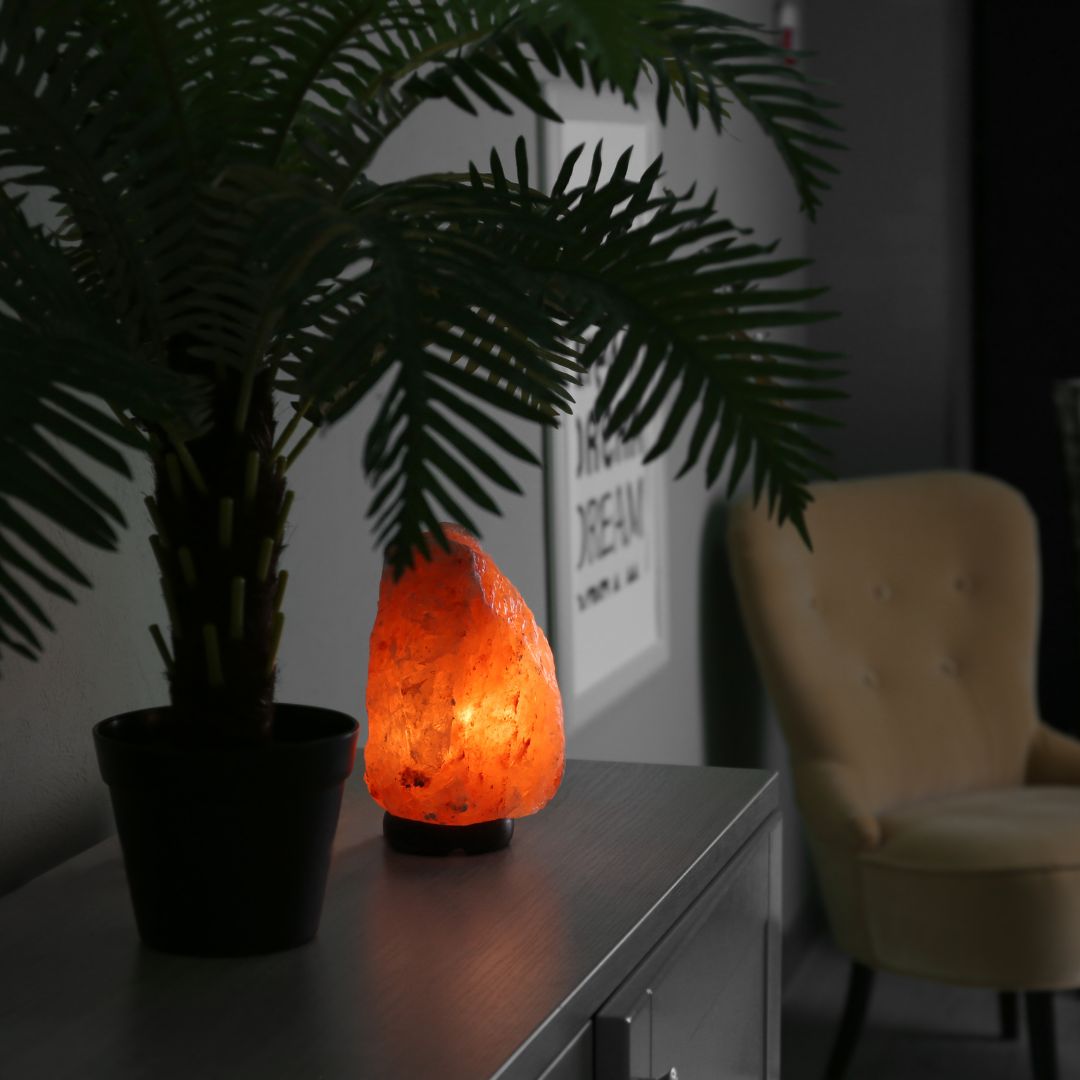 Salt lamp glows on table