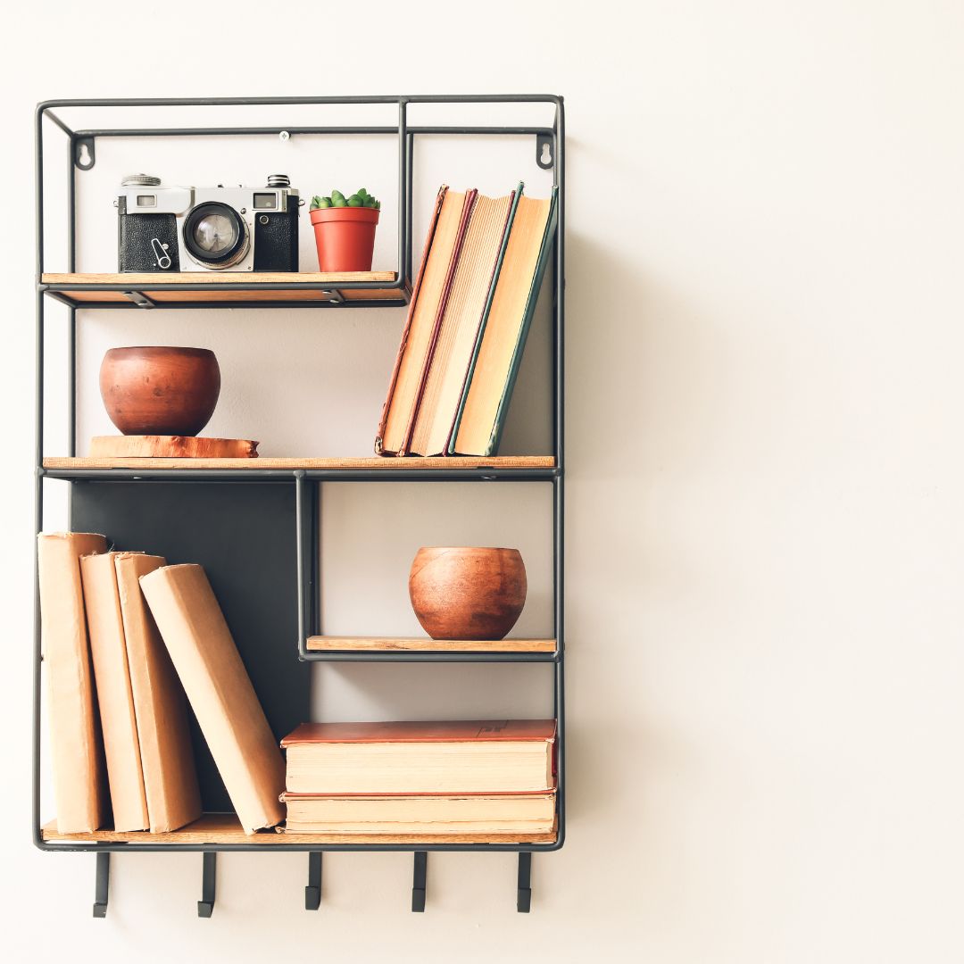 Stylized bookshelf hanging on wall