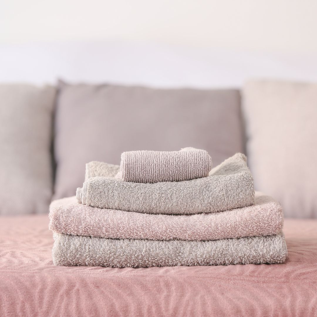 towels on bedsheets