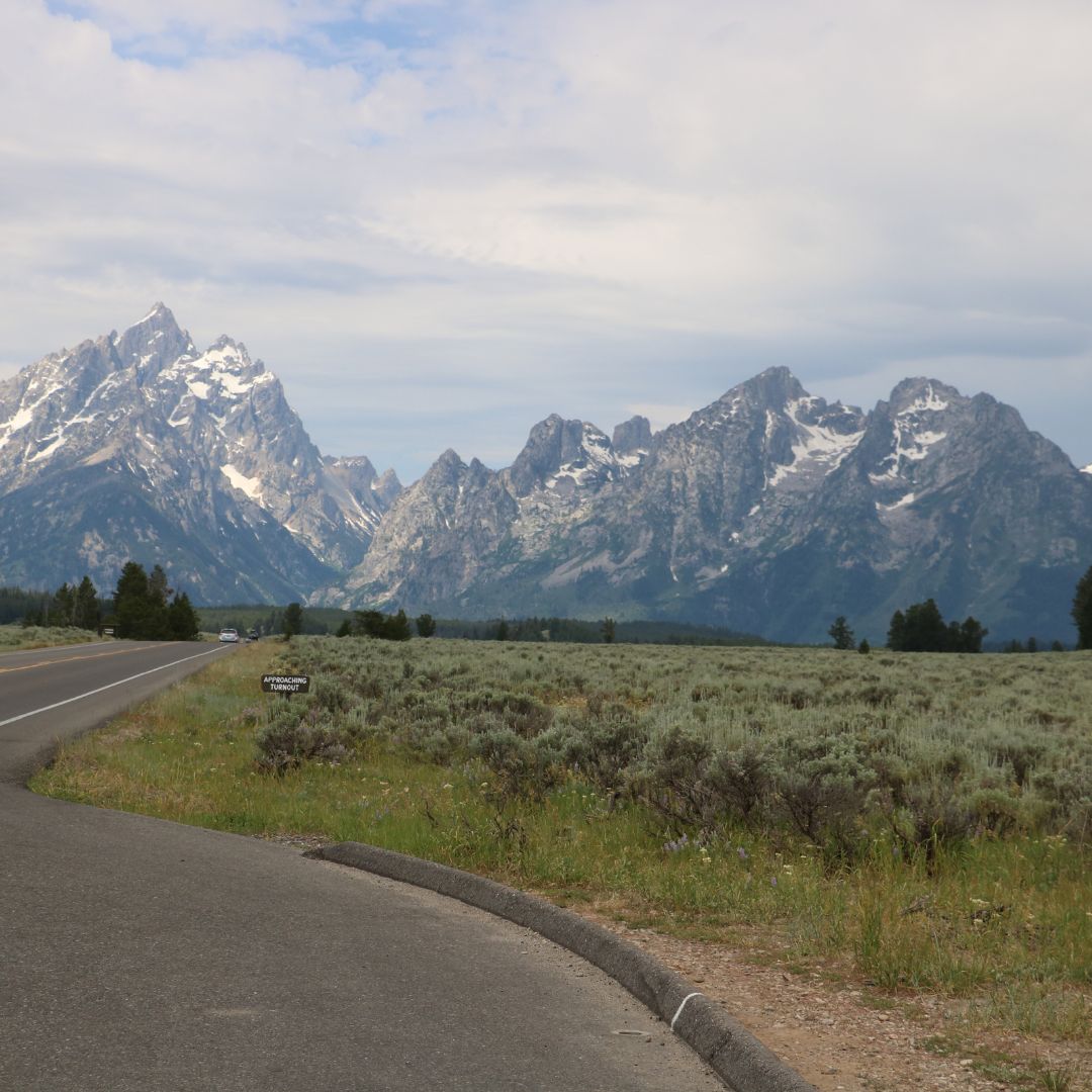 pull off of a road looking at  mountains