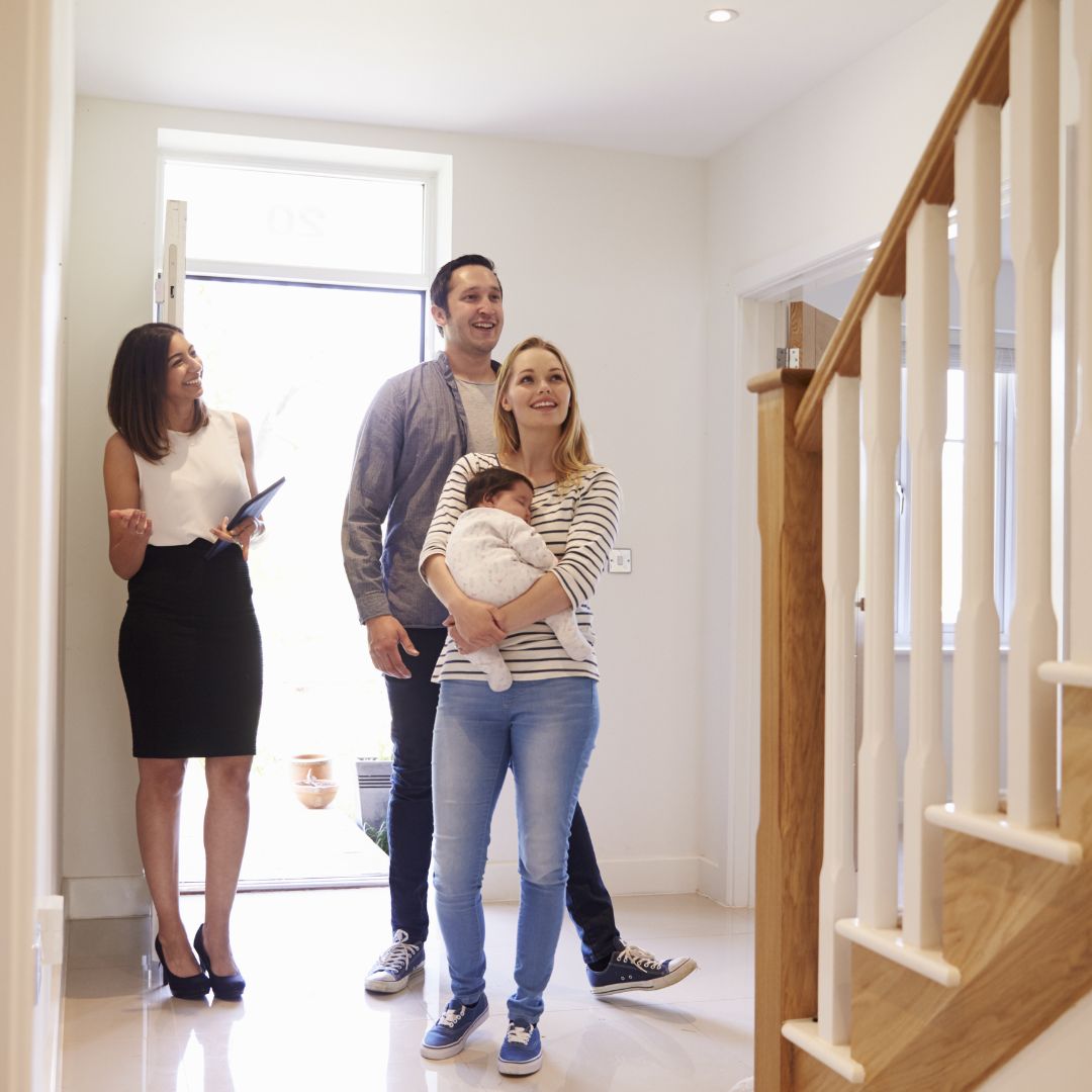 group looking through a house available for rent