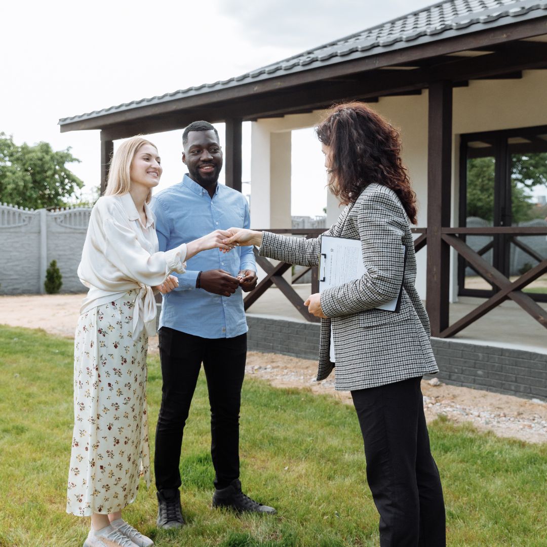 Couple with a real estate agent