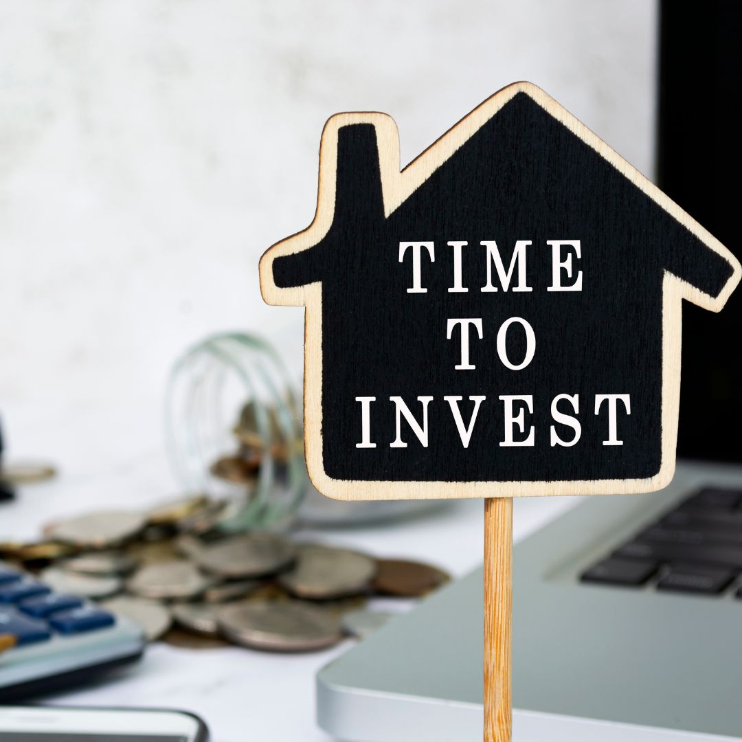 Home with Time To Invest Sign